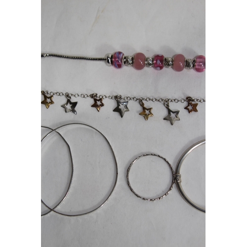 921 - QUANTITY OF SILVER BRACELETS IN VARIOUS DESIGNS - 56G