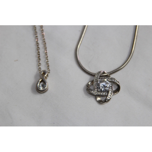 946 - TWO SILVER PENDANT NECKLACES