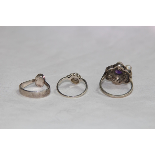 950 - THREE SILVER RINGS ONE SET WITH AN OPAL