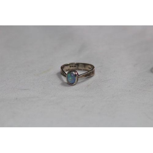 950 - THREE SILVER RINGS ONE SET WITH AN OPAL