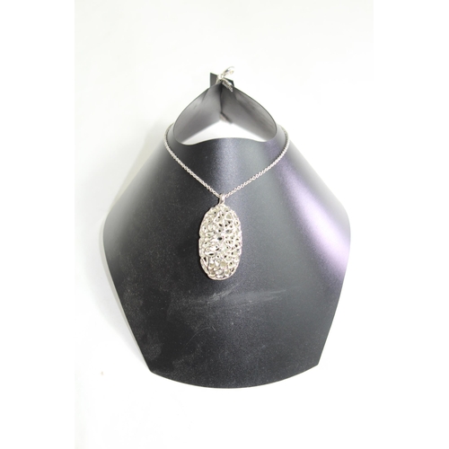 951 - VERY LARGE SILVER PENDANT NECKLACE OF PIERCED OVAL DESIGNS