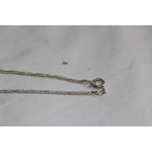 939 - TWO LARGE CRUCIFIX SILVER NECKLACES