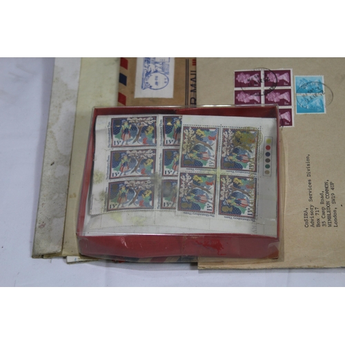 304 - VINTAGE STAMP ALBUM AND QUANTITY OF STAMPS