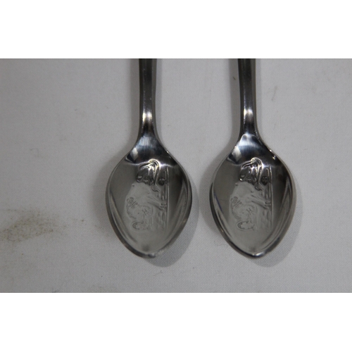 857 - PAIR OF ROLEX COMEMMORATIVE SPOONS