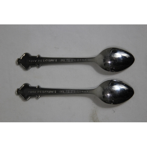 857 - PAIR OF ROLEX COMEMMORATIVE SPOONS