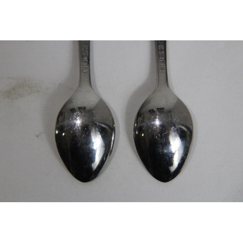 857 - PAIR OF ROLEX COMEMMORATIVE SPOONS