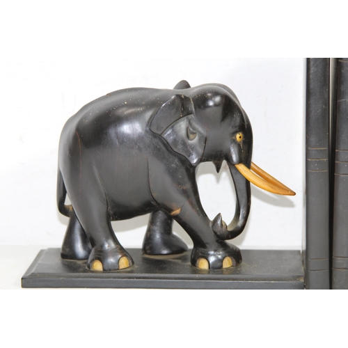 413 - PAIR OF VINTAGE EBONY ELEPHANT BOOK ENDS
21CM