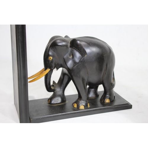 413 - PAIR OF VINTAGE EBONY ELEPHANT BOOK ENDS
21CM