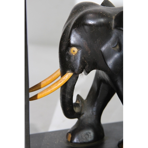 413 - PAIR OF VINTAGE EBONY ELEPHANT BOOK ENDS
21CM