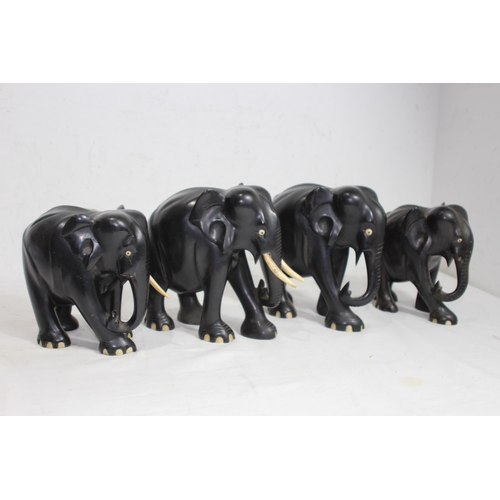 414 - QUANTITY OF VINTAGE EBONY ELEPHANTS x10
18CM