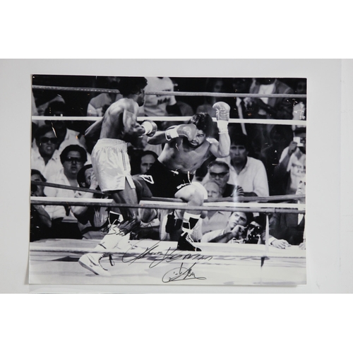 101 - TWO SIGNED BOXING PHOTOGRAPHS - MICHAEL WATSON AND ONE OTHER
70 X 50CM