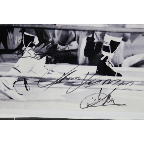 101 - TWO SIGNED BOXING PHOTOGRAPHS - MICHAEL WATSON AND ONE OTHER
70 X 50CM