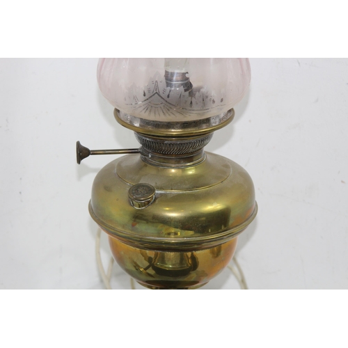 193 - VINTAGE CONVERTED OIL LAMP AND A COACHING LAMP
39CM