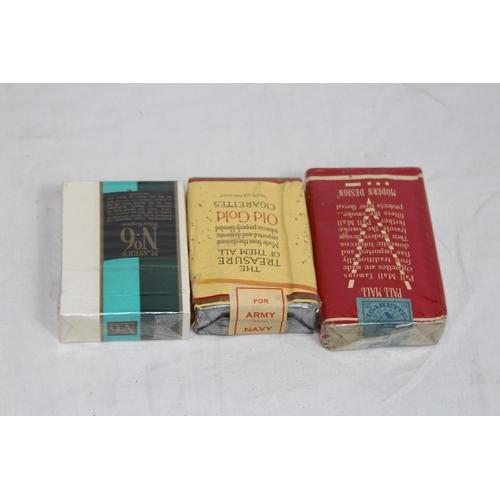 485 - LARGE QUANTITY OF MATCHBOX TOPS AND VARIOUS VINTAGE CIGARETTES AND PACKETS