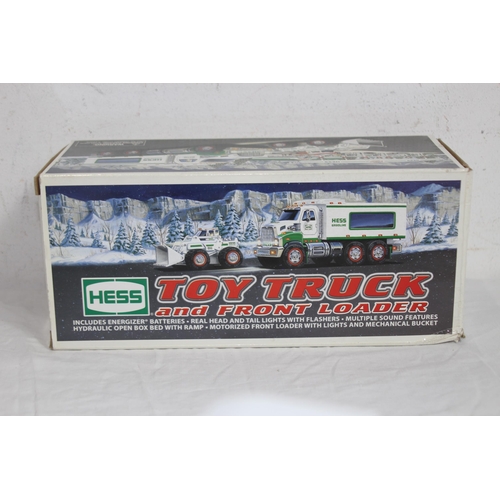 619 - BOXED HESS TOY TRUCK AND FRONT LOADER
27 X 12CM