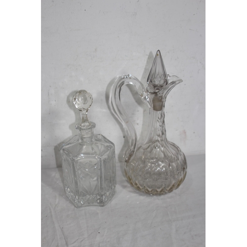 283 - FLAT BOTTOM SHIP DECANTER AND SIX OTHER DECANTERS ALL WITH STOPPERS x7