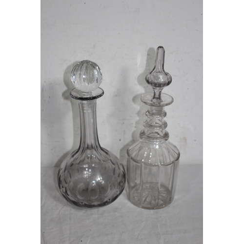 283 - FLAT BOTTOM SHIP DECANTER AND SIX OTHER DECANTERS ALL WITH STOPPERS x7