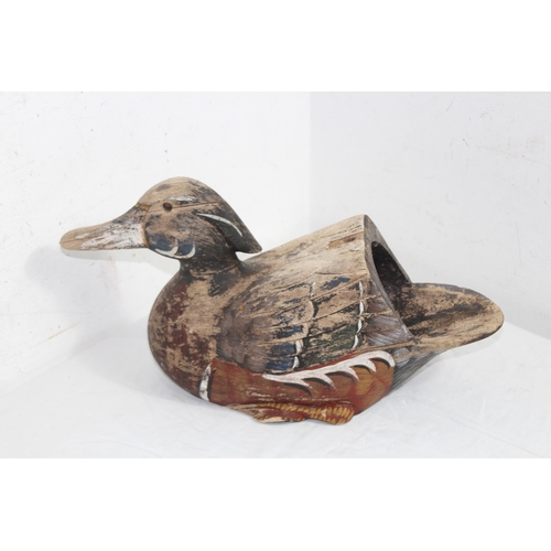 291 - TWO WOODEN DECORATIVE DUCKS 
38 X 20CM