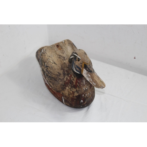 291 - TWO WOODEN DECORATIVE DUCKS 
38 X 20CM