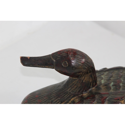 291 - TWO WOODEN DECORATIVE DUCKS 
38 X 20CM