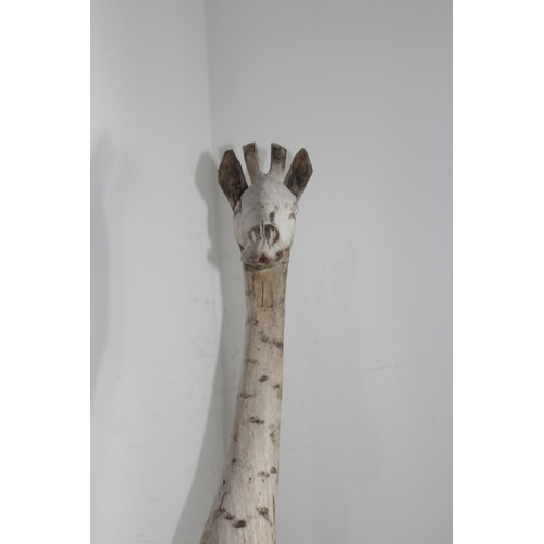 293 - LARGE CARVED WOODEN GIRAFFE AND A SELECTION OF AFRICAN WOODEN PIECES
106CM