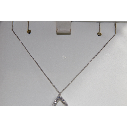 1133 - 9CT WHITE AND DIAMOND SET PENDANT NECKLACE - 1.30G TOTAL WEIGHT