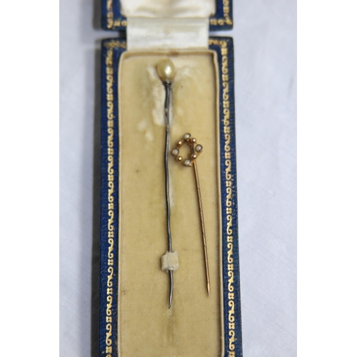 1139 - 9CT GOLD STICK PIN AND A WHITE METAL STICK PIN - 0.75G