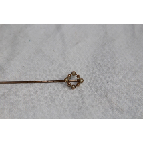 1139 - 9CT GOLD STICK PIN AND A WHITE METAL STICK PIN - 0.75G