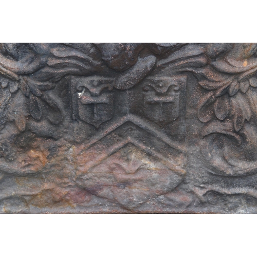 97 - ANTIQUE 1650 CAST IRON FIRE BACK WITH SHEILD AND GRIFFIN DESIGN - HEAVY
74 X 56CM