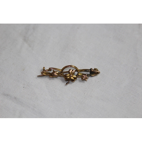 1144 - 9CT GOLD FLORAL DESIGN BROOCH - 1.40G TOTAL WEIGHT