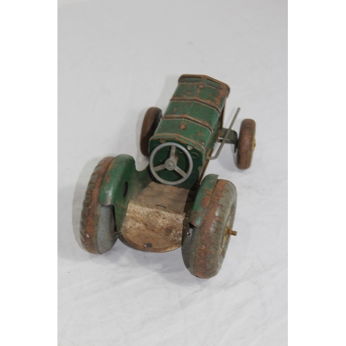 632 - 2 X VINTAGE TIN TOY TRACTORS
20 X 14CM