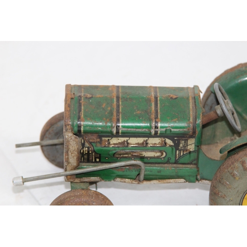 632 - 2 X VINTAGE TIN TOY TRACTORS
20 X 14CM