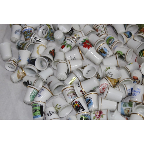 202 - COLLECTION OF OVER 600 CERAMIC, METAL AND WOODEN DECORATIVE THIMBLES