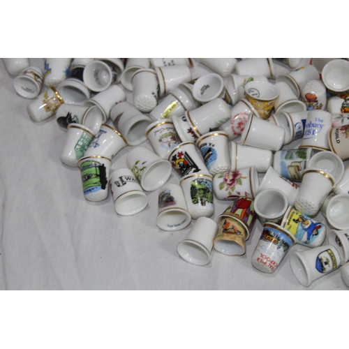 202 - COLLECTION OF OVER 600 CERAMIC, METAL AND WOODEN DECORATIVE THIMBLES