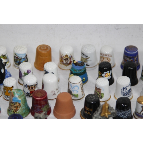 202 - COLLECTION OF OVER 600 CERAMIC, METAL AND WOODEN DECORATIVE THIMBLES