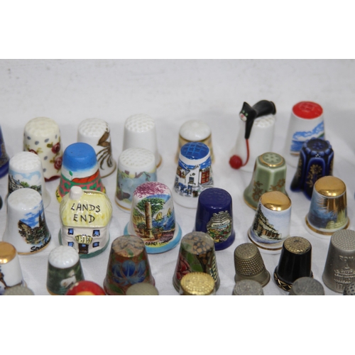 202 - COLLECTION OF OVER 600 CERAMIC, METAL AND WOODEN DECORATIVE THIMBLES