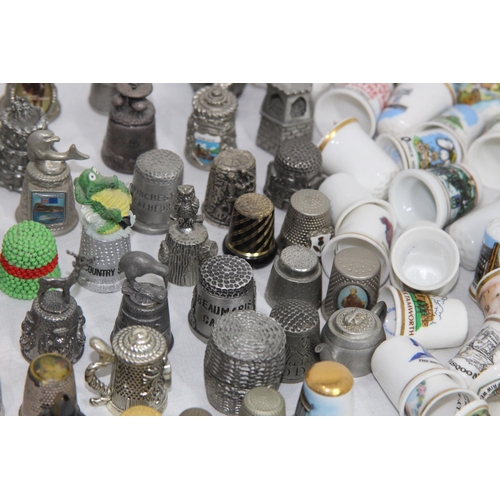 202 - COLLECTION OF OVER 600 CERAMIC, METAL AND WOODEN DECORATIVE THIMBLES