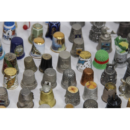 202 - COLLECTION OF OVER 600 CERAMIC, METAL AND WOODEN DECORATIVE THIMBLES