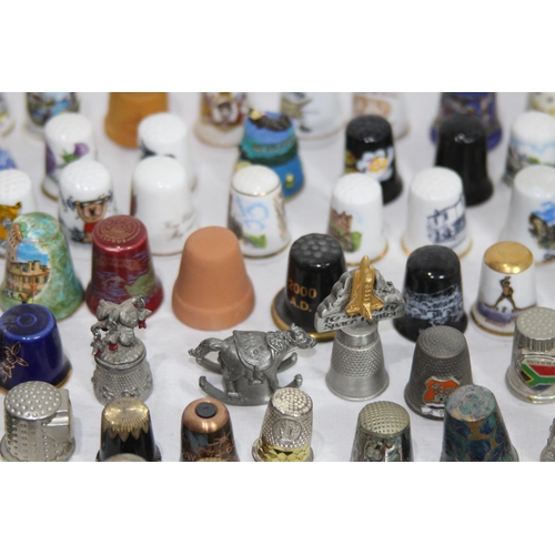 202 - COLLECTION OF OVER 600 CERAMIC, METAL AND WOODEN DECORATIVE THIMBLES