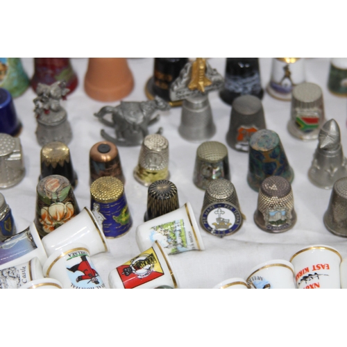 202 - COLLECTION OF OVER 600 CERAMIC, METAL AND WOODEN DECORATIVE THIMBLES