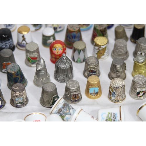 202 - COLLECTION OF OVER 600 CERAMIC, METAL AND WOODEN DECORATIVE THIMBLES