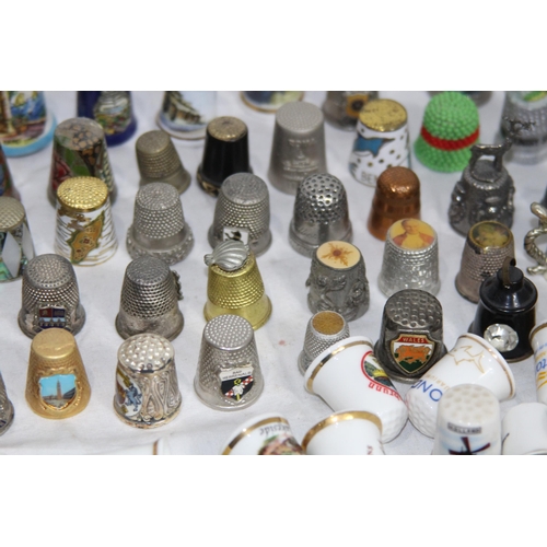 202 - COLLECTION OF OVER 600 CERAMIC, METAL AND WOODEN DECORATIVE THIMBLES