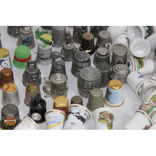 202 - COLLECTION OF OVER 600 CERAMIC, METAL AND WOODEN DECORATIVE THIMBLES