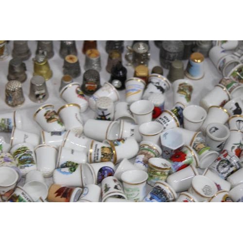 202 - COLLECTION OF OVER 600 CERAMIC, METAL AND WOODEN DECORATIVE THIMBLES