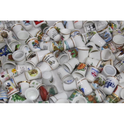 202 - COLLECTION OF OVER 600 CERAMIC, METAL AND WOODEN DECORATIVE THIMBLES