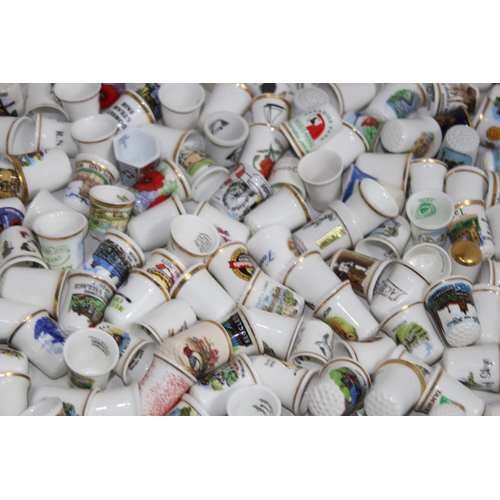 202 - COLLECTION OF OVER 600 CERAMIC, METAL AND WOODEN DECORATIVE THIMBLES