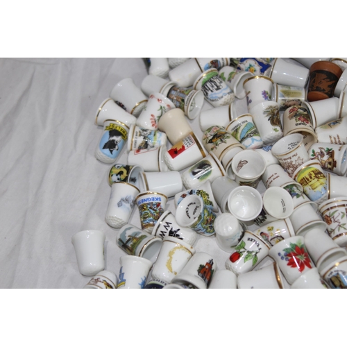 202 - COLLECTION OF OVER 600 CERAMIC, METAL AND WOODEN DECORATIVE THIMBLES