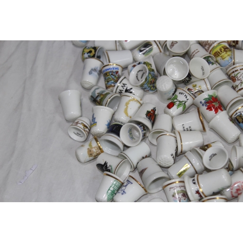 202 - COLLECTION OF OVER 600 CERAMIC, METAL AND WOODEN DECORATIVE THIMBLES