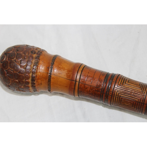 284 - LATE 19TH EARLY 20TH CENTURY CARVED ORIENTAL BAMBOO WALKING STICK
86CM