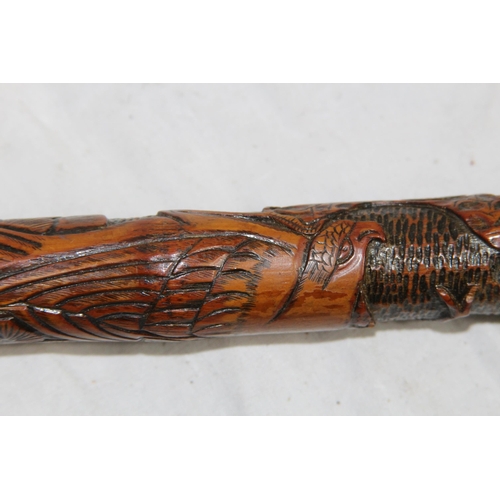 284 - LATE 19TH EARLY 20TH CENTURY CARVED ORIENTAL BAMBOO WALKING STICK
86CM